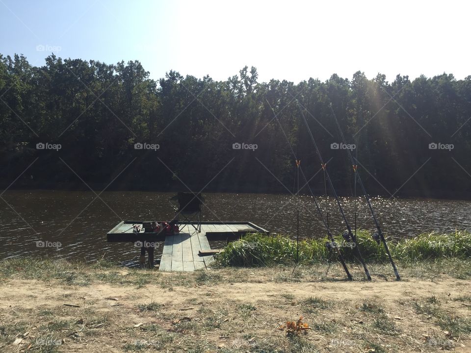 Fishing on a lake in summer