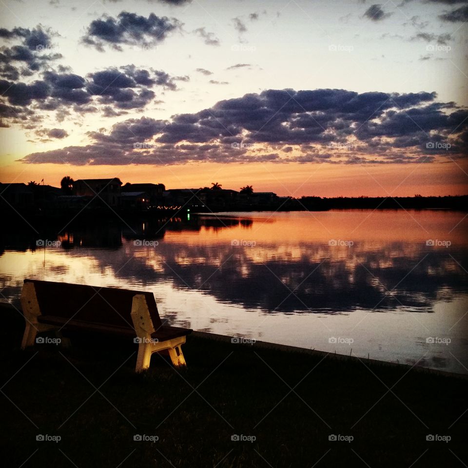 Clouds reflected on river