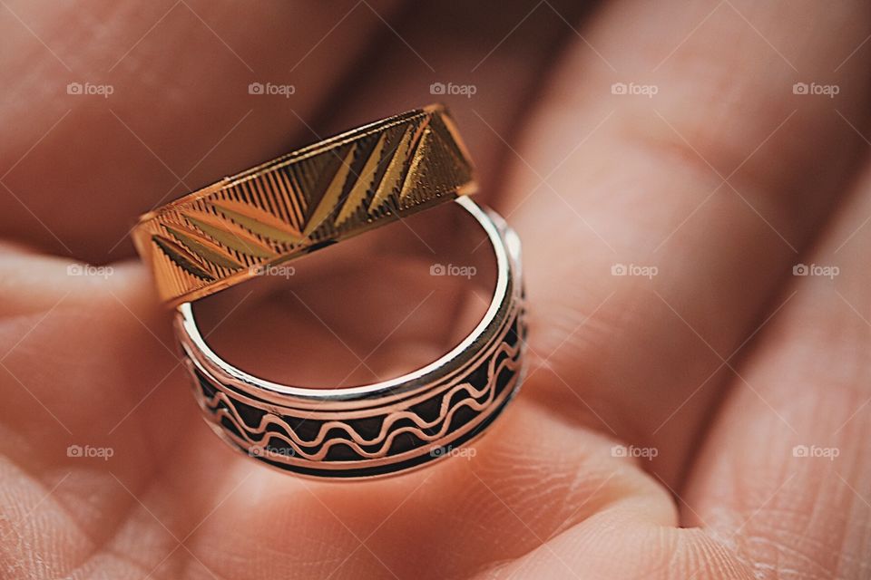 Wedding Rings, Macro Shot Of Rings, Gold And Silver Rings, Closeup Of Patterns, Rings In Hand, Details Of Wedding Rings 