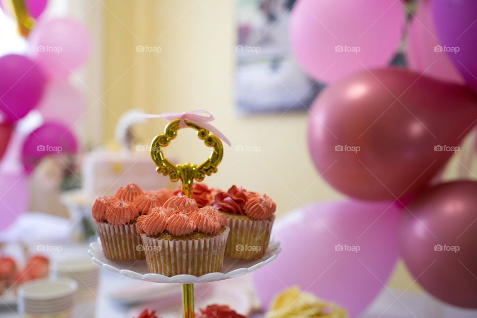 pink muffins for baby girl birthday party