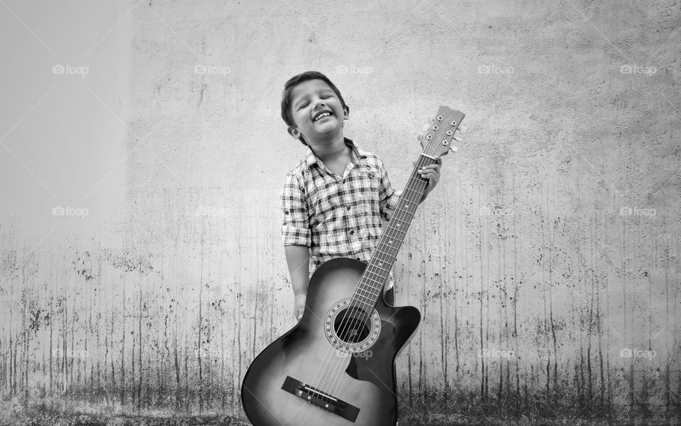 baby boy with guitar