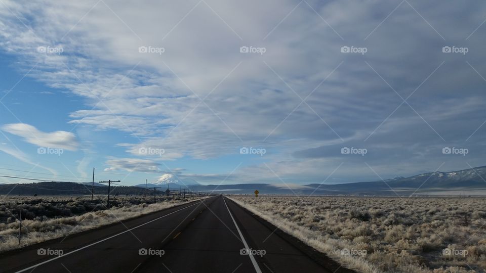 open roads with mountain landscape