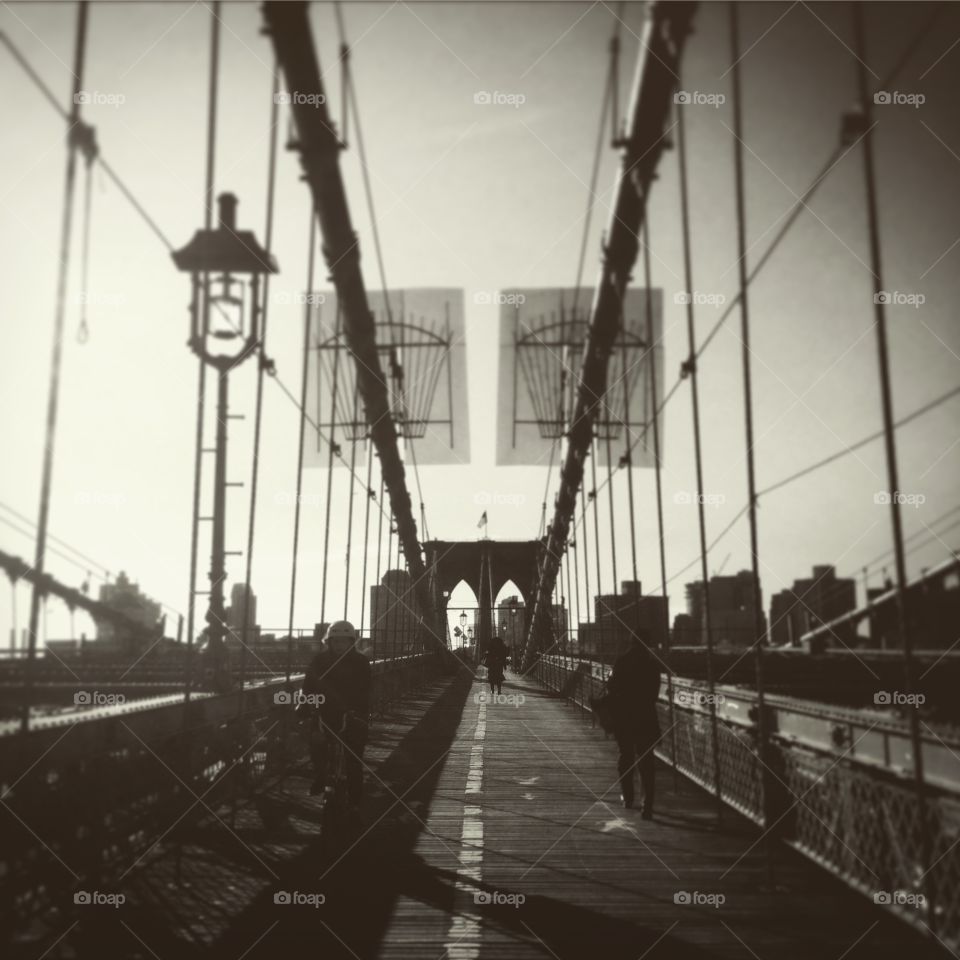 Black and white Brooklyn bridge. Taken on a March morning heading across  the Brooklyn Bridge 