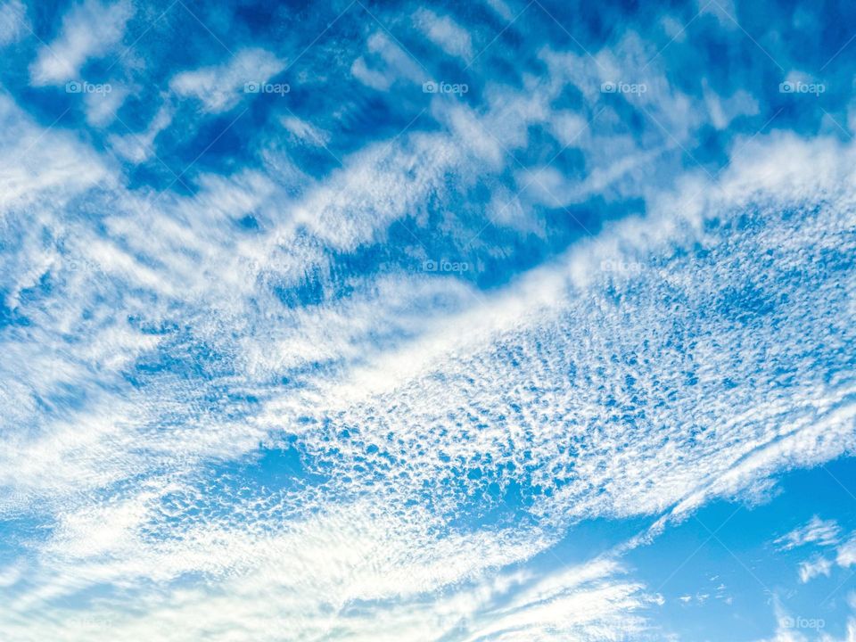 Amazing cloudscape in a deep blue sky.