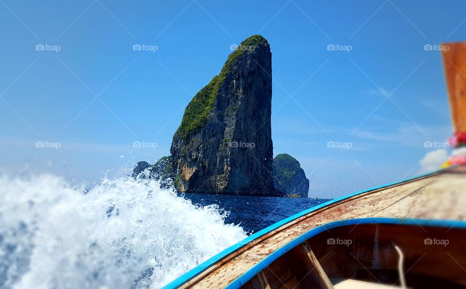 Phi Phi Thailand is so peaceful and beautiful. On a long tail boat exploring was amazing.