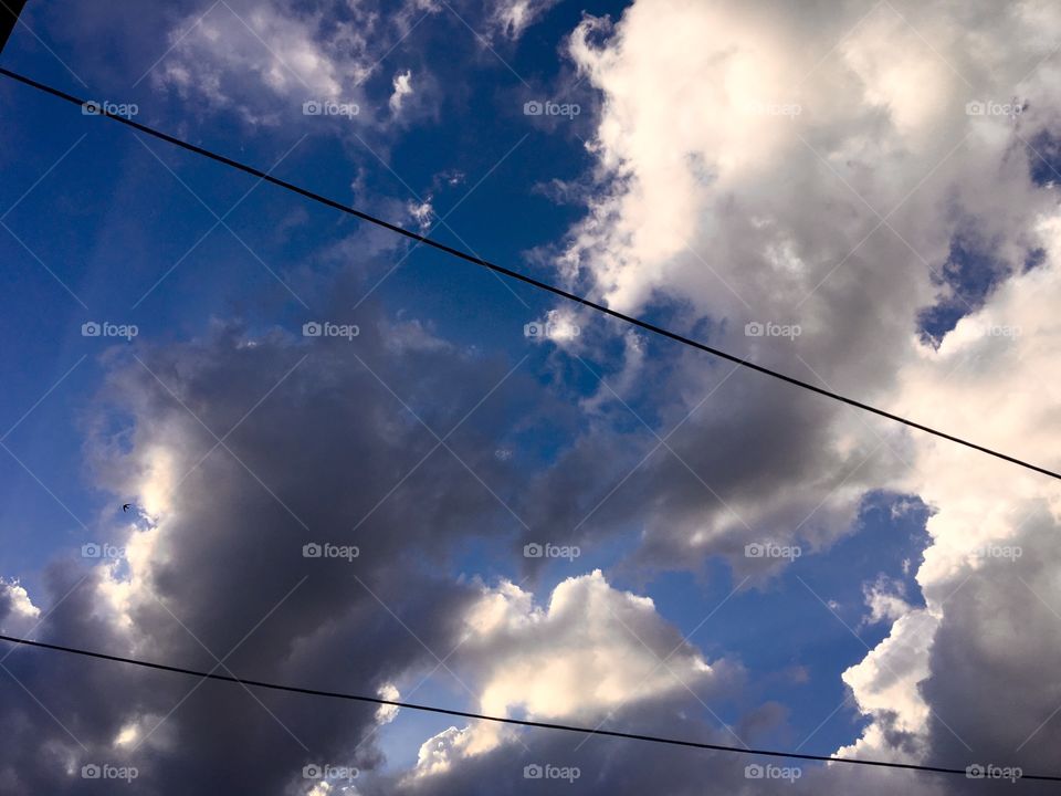 Blue sky with rainclouds