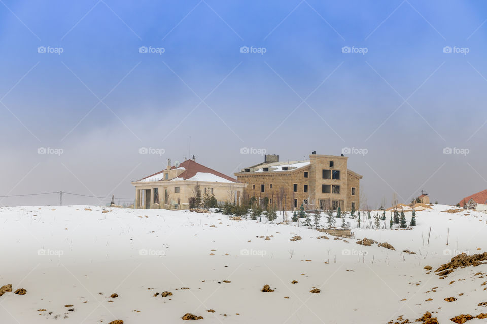 Snow covering houses