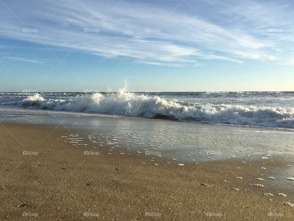 Crashing waves on beach