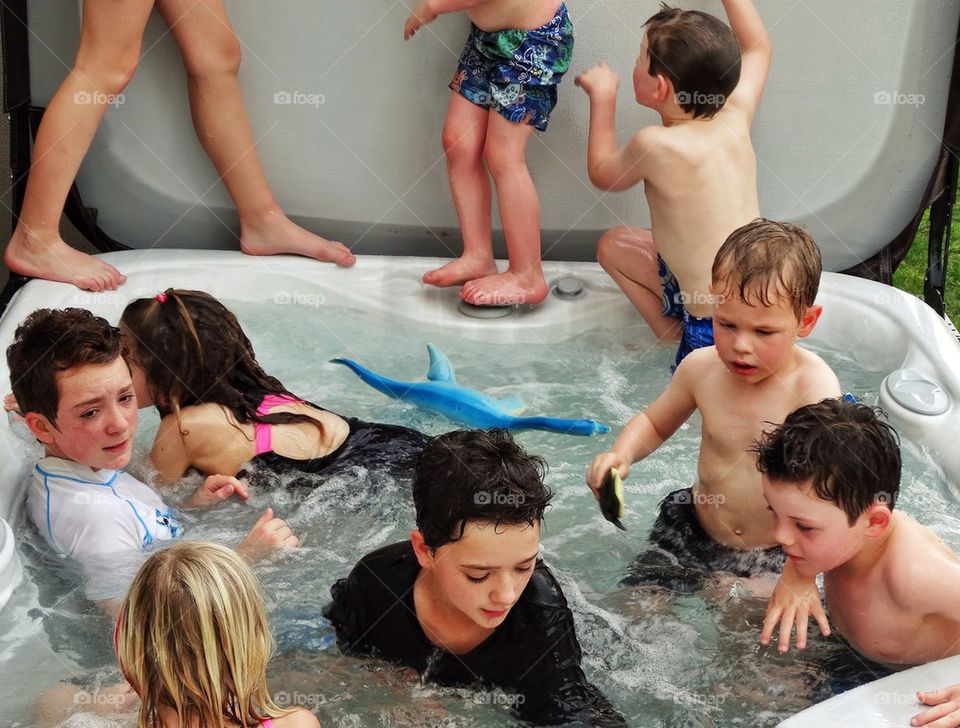 Crowded Jacuzzi. Lots Of Kids In A Hot Tub
