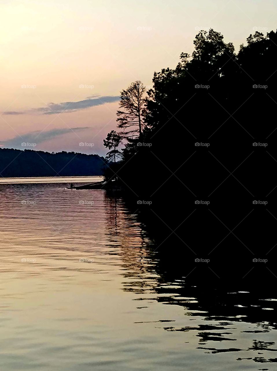 sunset and reflections on the lake.