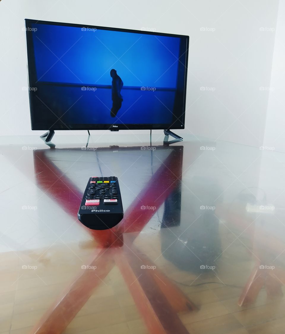 Remote control in front of the television