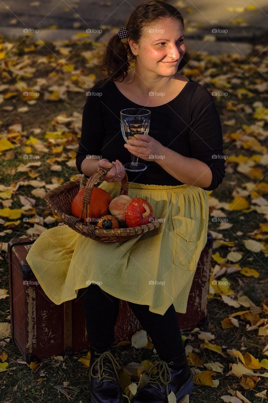 Portrait of a woman on a sunny autumn day outside