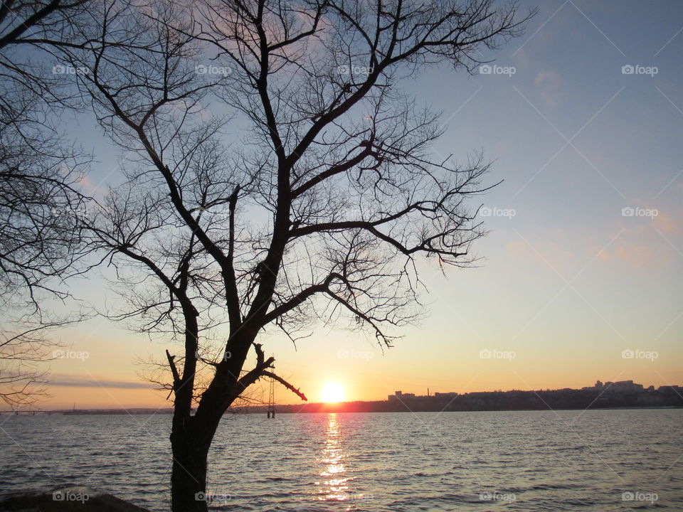 sunset in December in Voronezh on the reservoir
