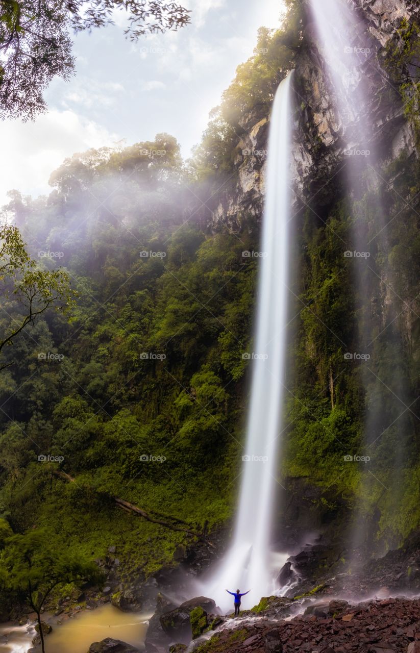 Admiring the waterfall