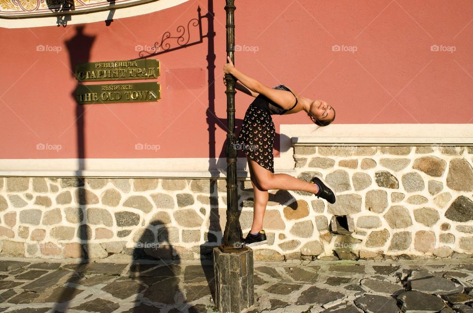 Young Female Ballerina Dancing Outside