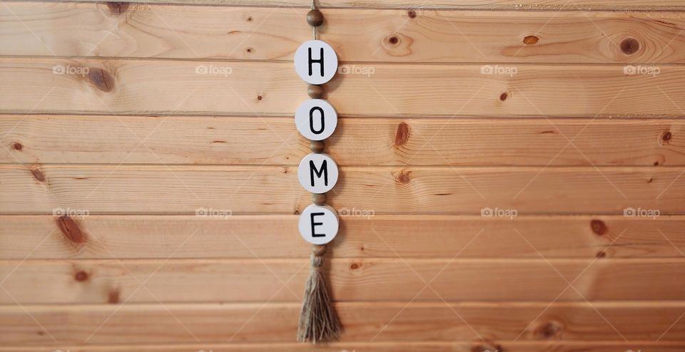 Hone sign on wall (middle)