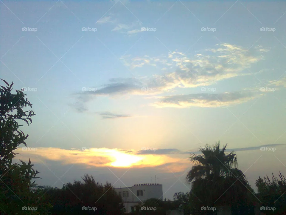 Sunset in a village of the Italian island of Ischia on a May day