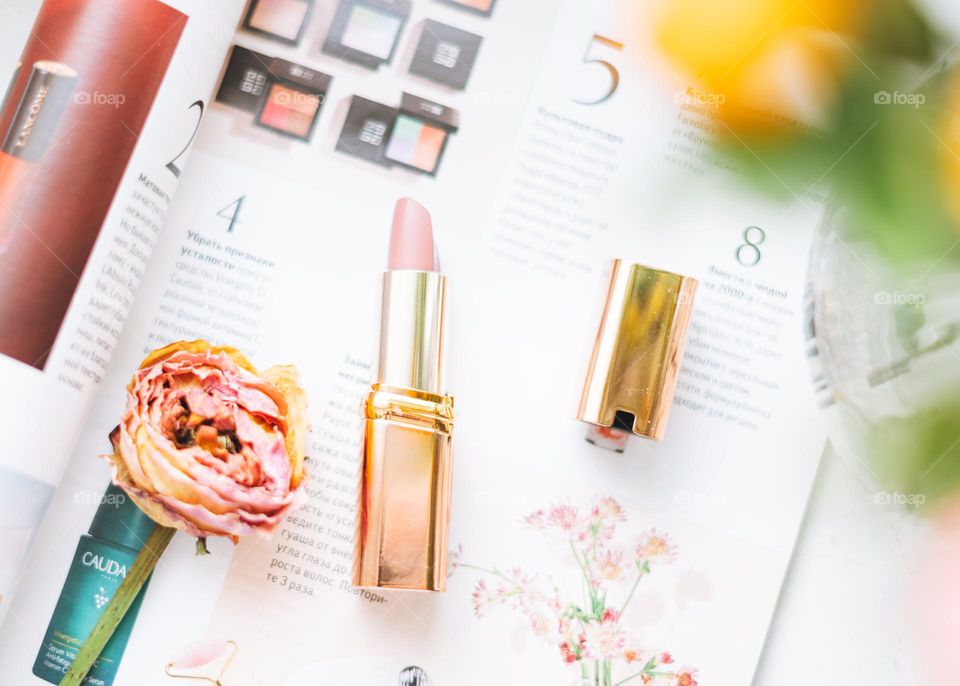 Makeup products on window sill