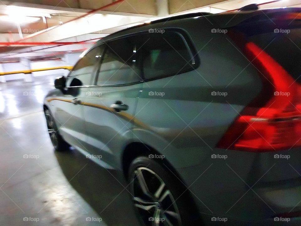 race journey motion business worker detail dealership buying speed power street trip electric futuristic fun vacation xenon electricity rent young model woman electric car parking highway shiny garage engine metallic reflection tire day vehicle car a