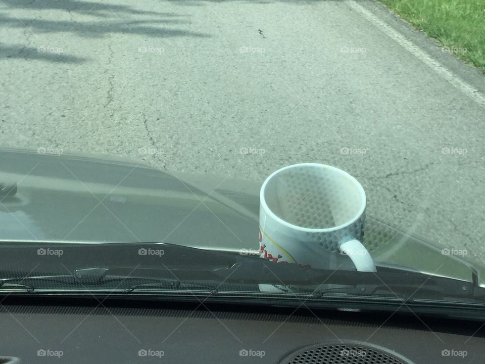 That moment when you realize you're just driven 5 miles with your coffee cup on your hood