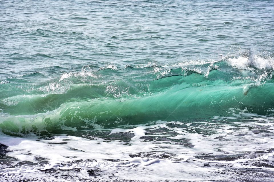 turquoise waves on atlantic ocean coast on la gomera canary island in Spain