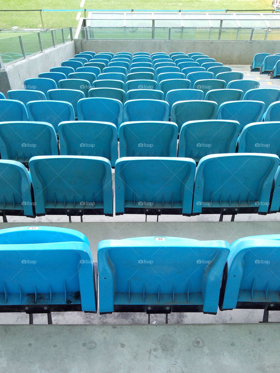 blue chairs. chairs of the Grêmio's Arena, soccer stadium in Porto Alegre, south of Brazil.