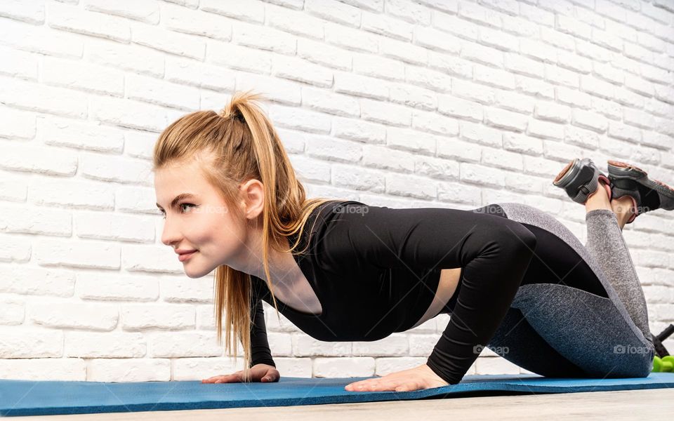 athletic woman working out at home