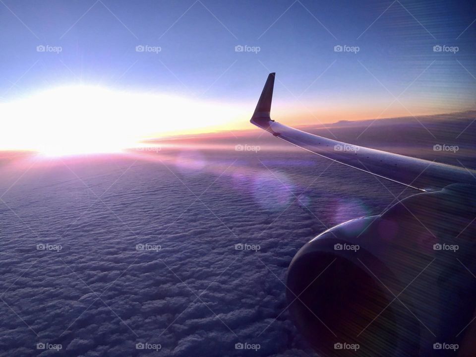 Looking out of a window of a plane … love purple 💜