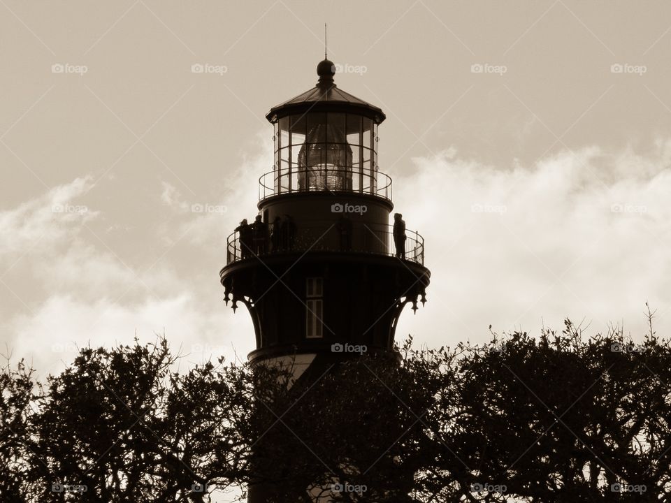 Saint Augustine Lighthouse tourist attraction, silhouette in sepia 