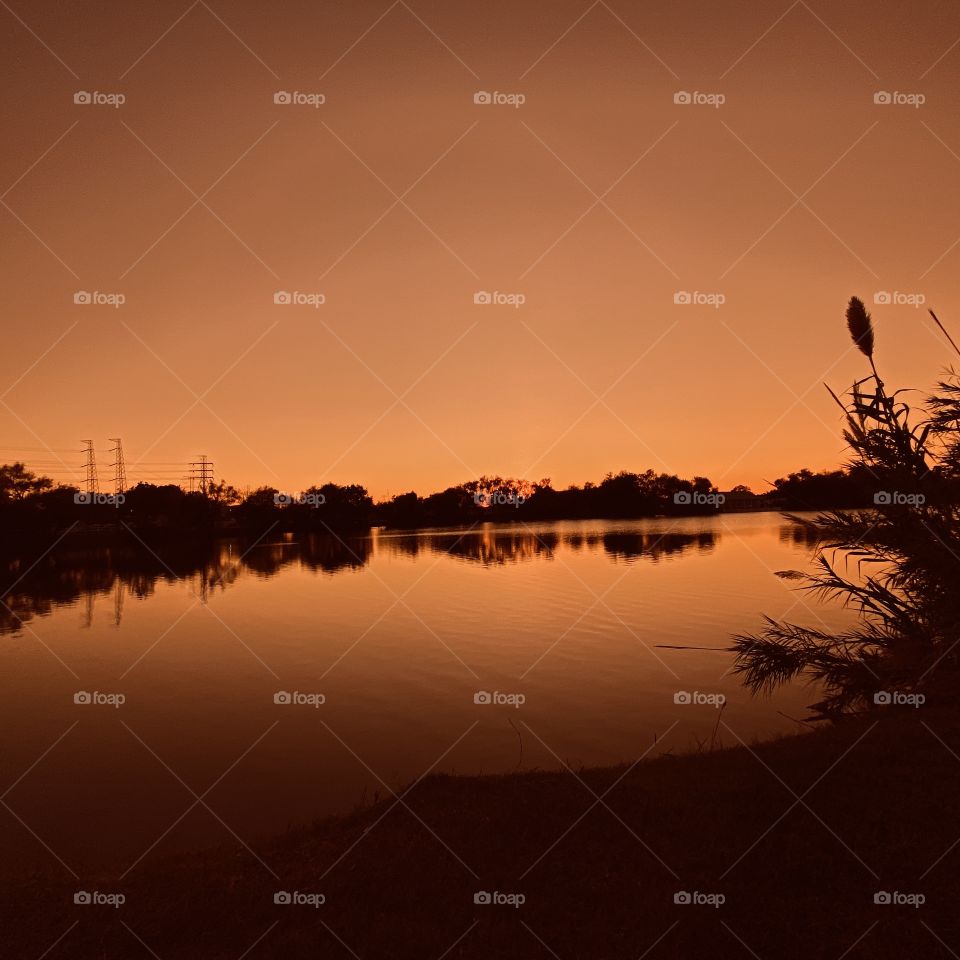 Oh what a Beautiful evening scene. Colours are blowing up the sky and Reflections over water. 