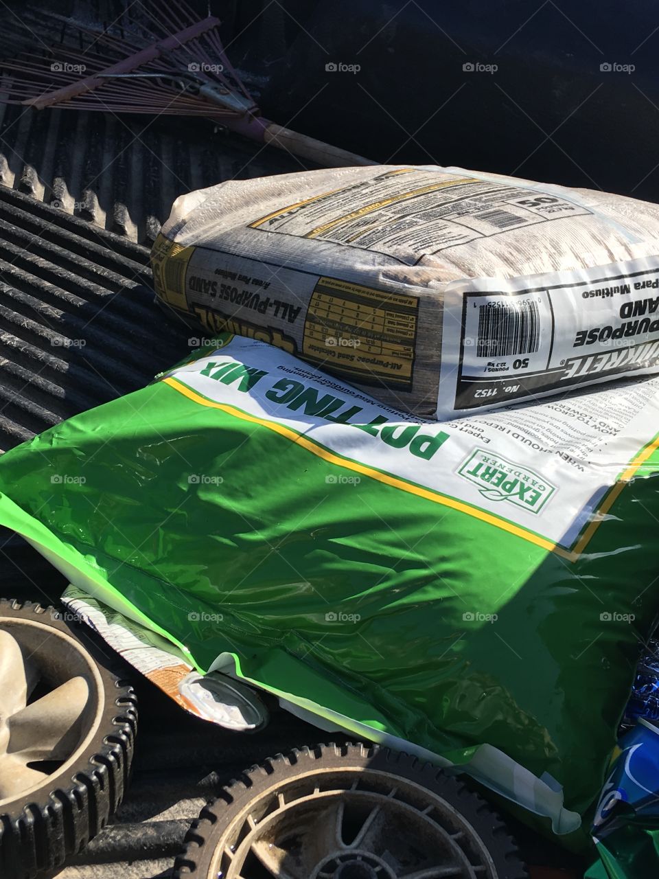 Getting ready for spring! One bag of potting soil and one bag of sand that’s just for starters.