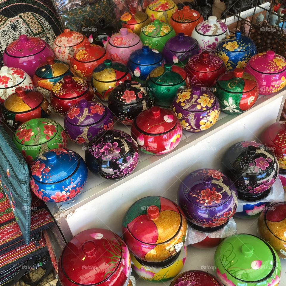 food container made from coco nut by Cambodian artists.