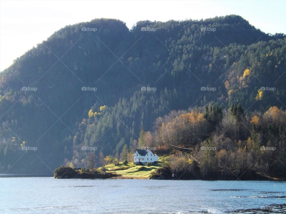 A lone Norwegian house by the fjords