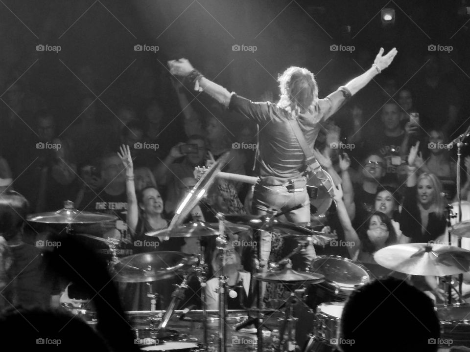 A singer soaks up the adoration of the crowd that came out to see his performance