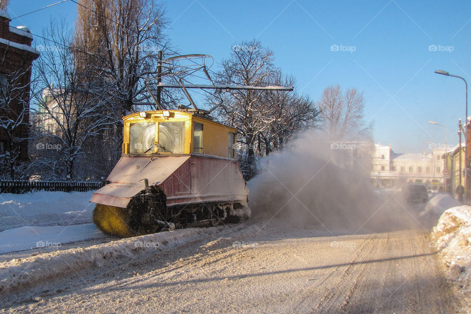 old railroad snow cleaning tram in action