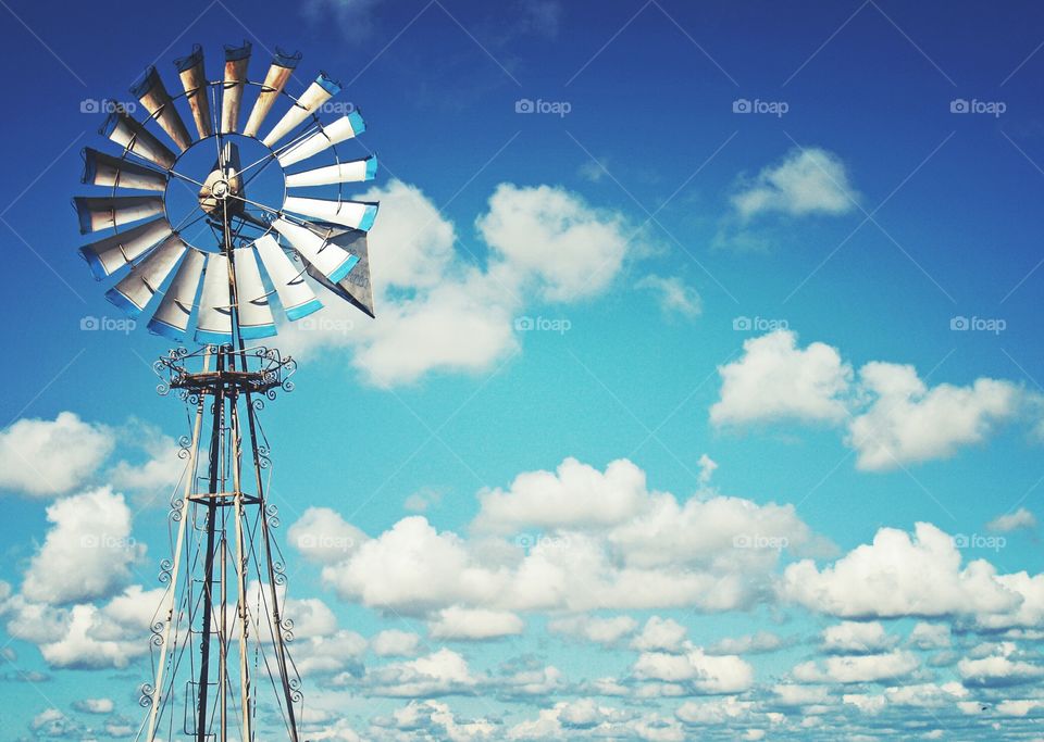 Windmill under a beautiful sky.