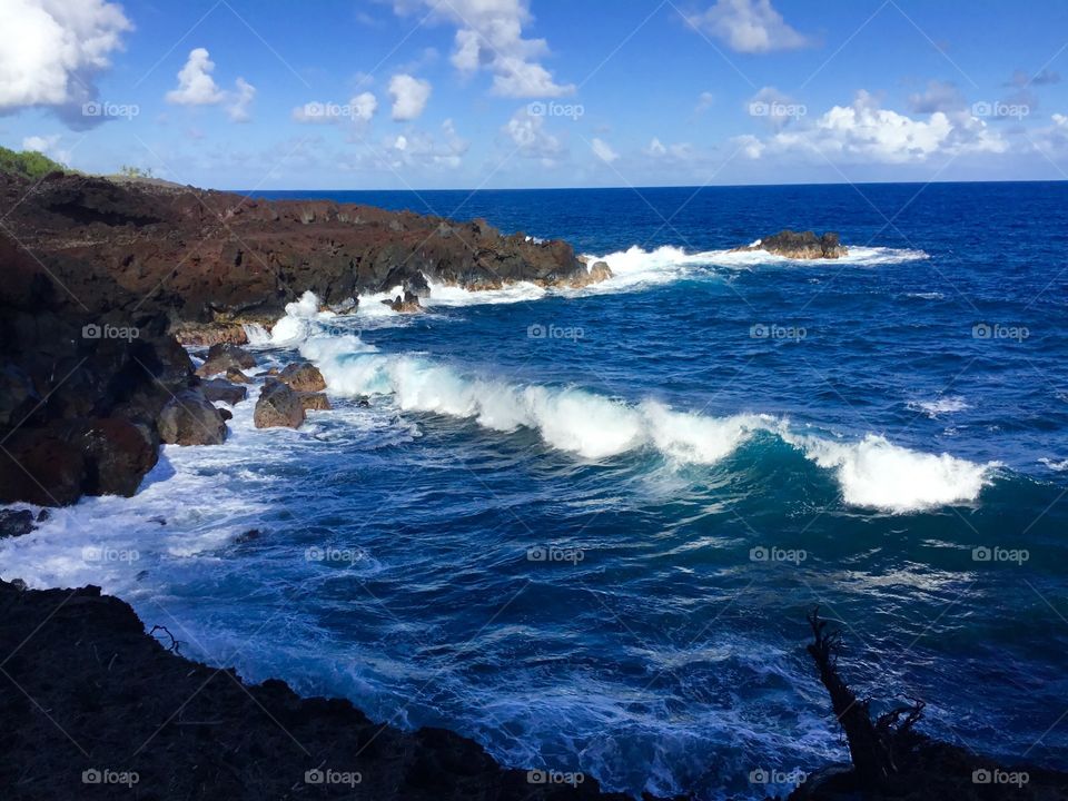 Blue skies, waves, and lava