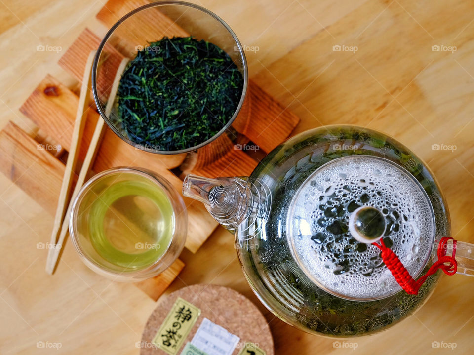 A tea ceremony is on of the asian way of welcoming friends and family. It shows hospitality of the house offering the visitor a sip to share in a most unique way