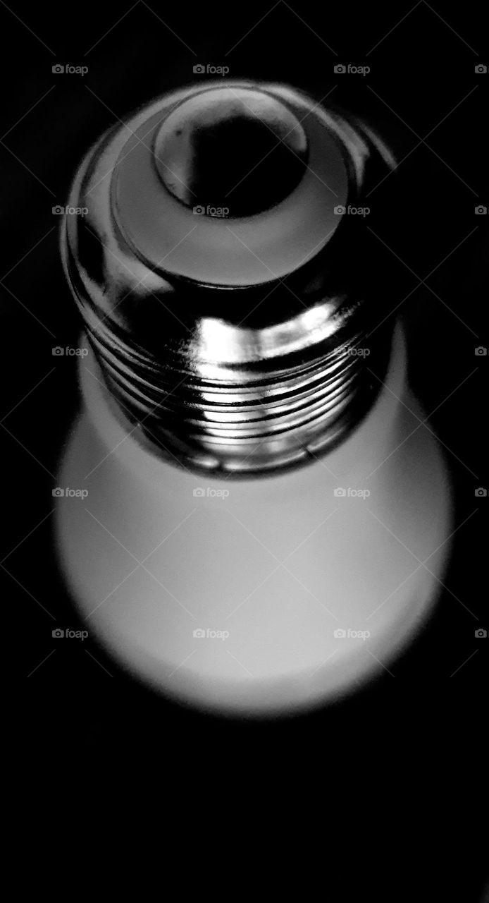 glass bulb with silver metal base, seen from another point of view.