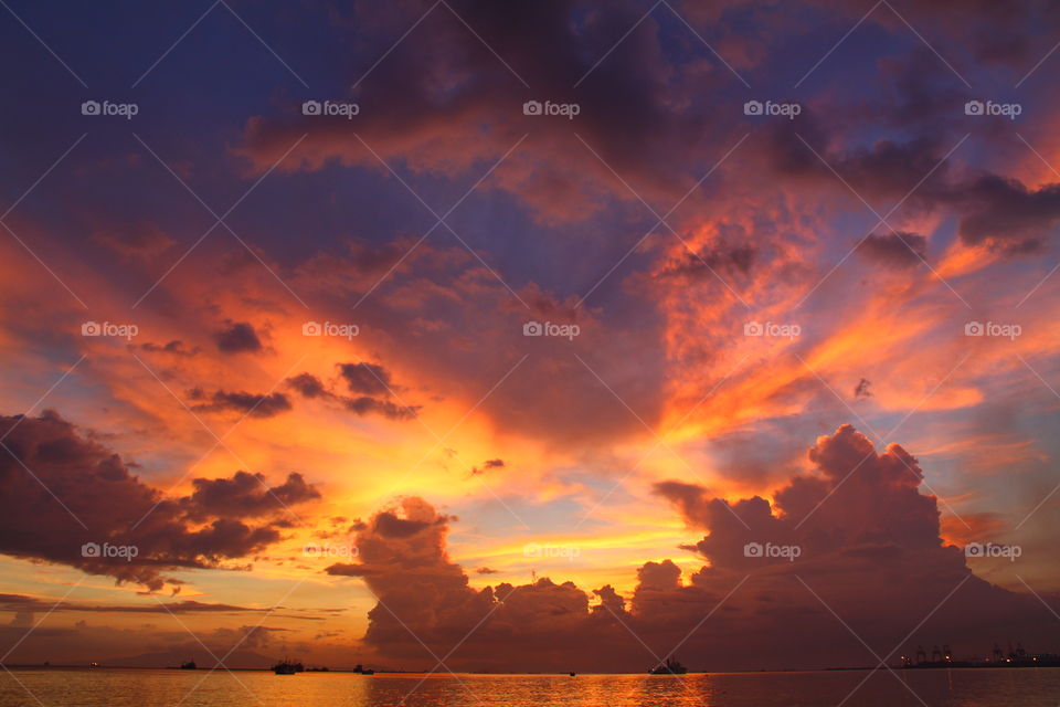 Scenic view of beach at sunset