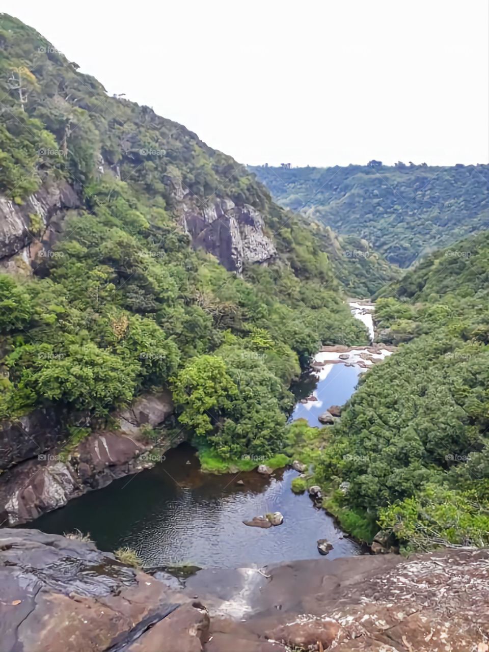 Hiking on the mountain where a small lake and waterfall spotted.!