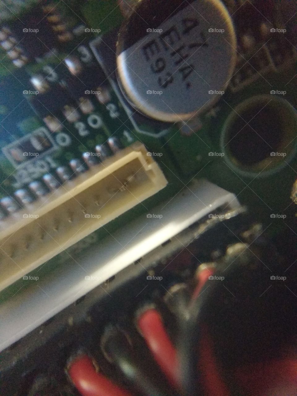 bent contact pins inside a data port on a circuit board