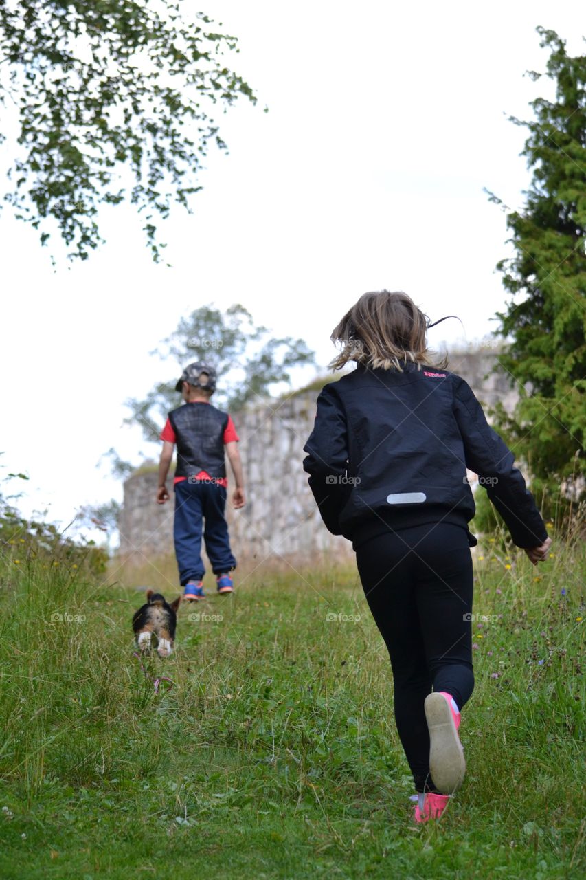 Running. Running children and a dog