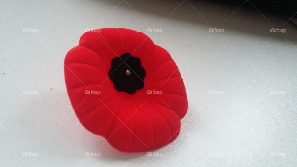 a beautiful red fake flower