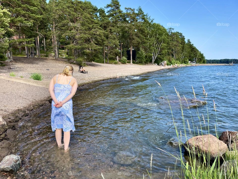 Warm summer day at Rantapuisto beach in Helsinki, Finland