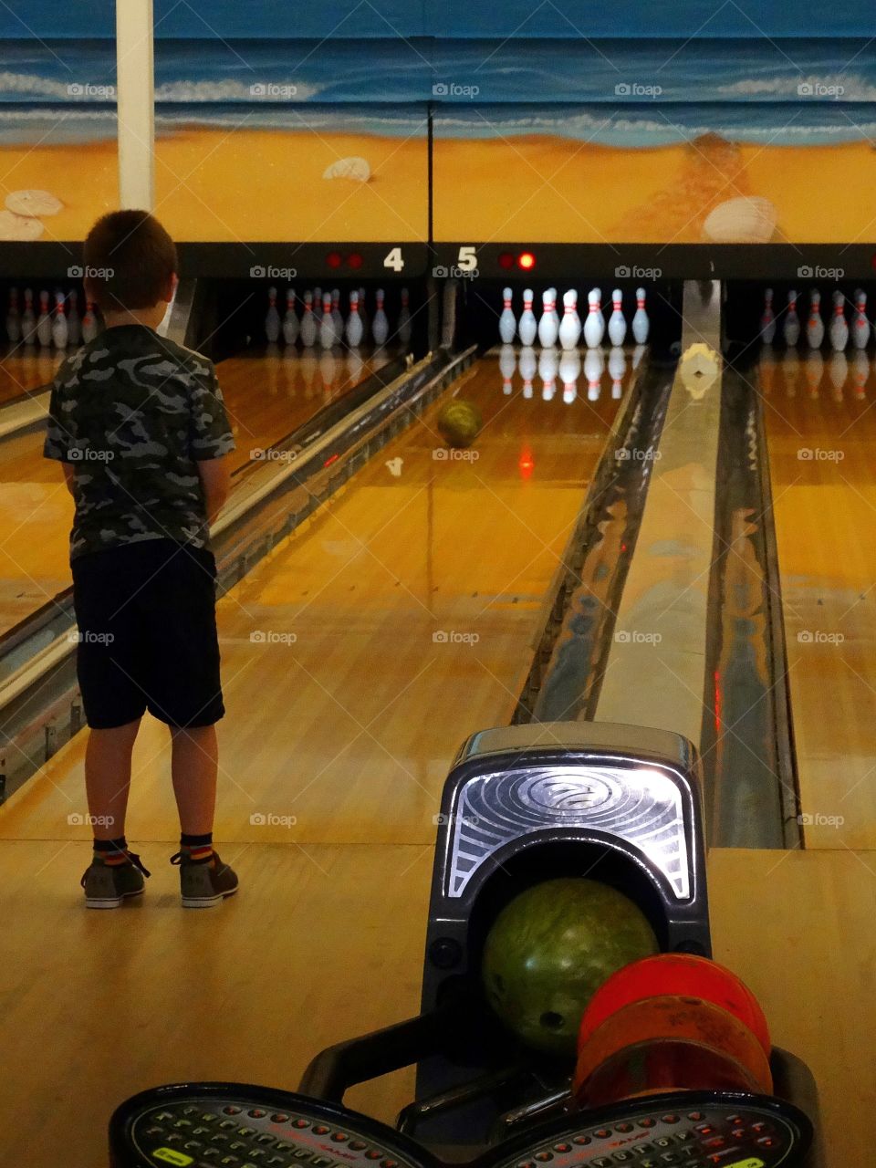 Boy In Bowling Alley