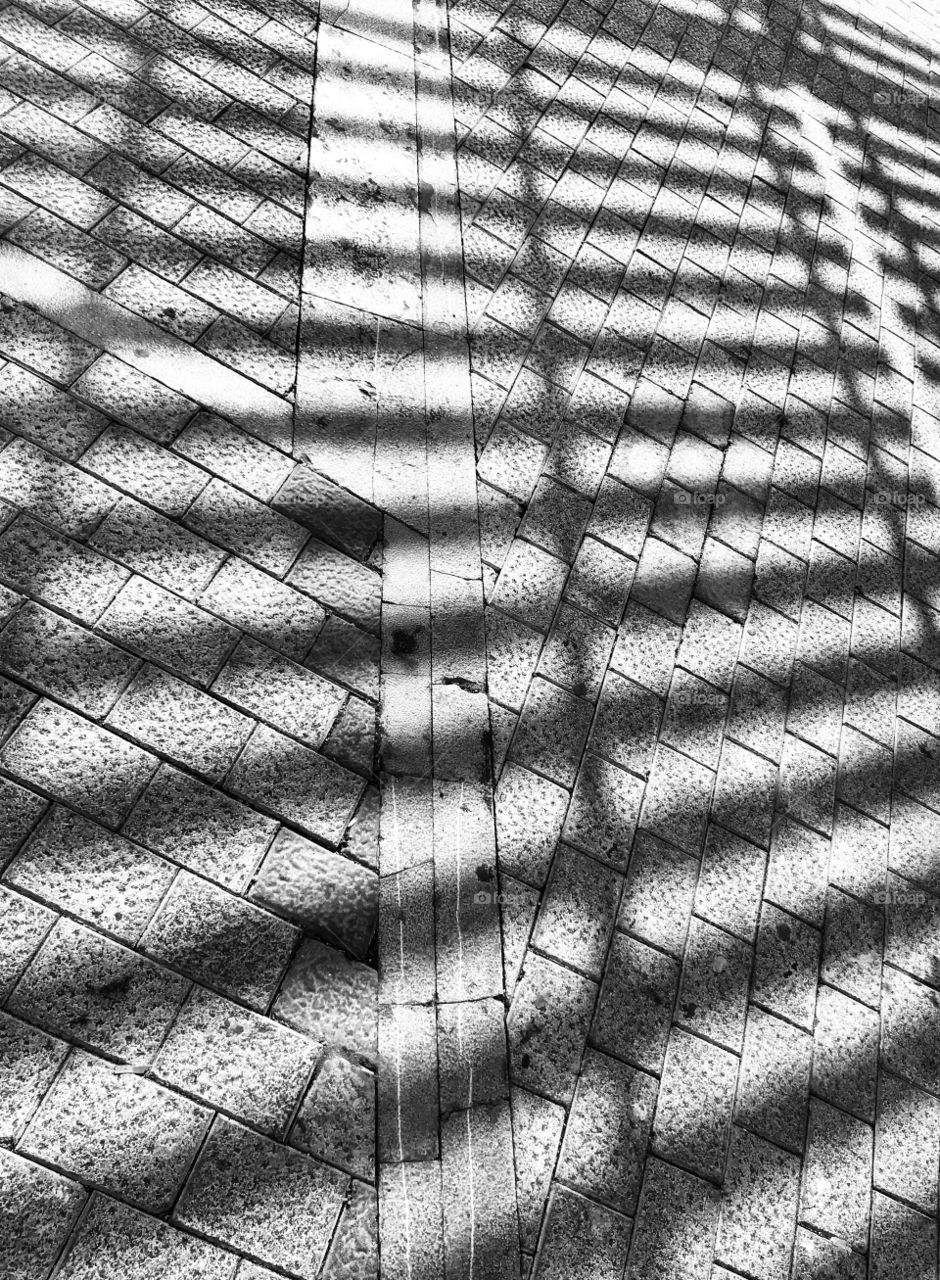 shadow of a pergola on the square in La Gomera, Spain