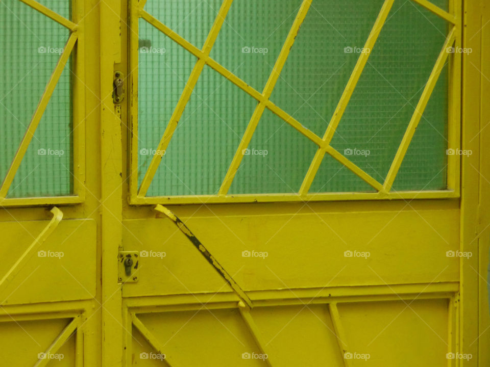 Yellow door with glass...