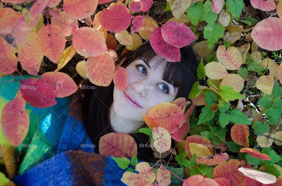 Energetic, Light-Hearted, and Vibrant Portrait of Girl on Autumn Background