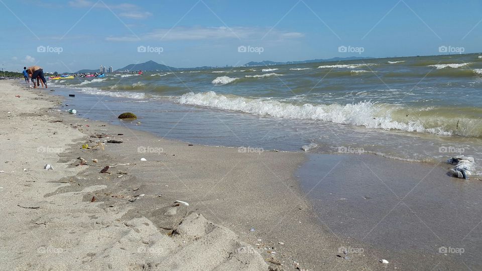 Sand and ocean waves